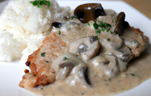 Savory Pork Chops in Creamy Mushroom Sauce with Fragrant Jasmine Rice