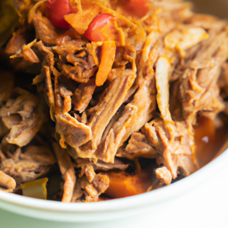 The Ultimate Slow Cooker Pulled Pork - A Flavorful and Irresistibly Sweet Dish